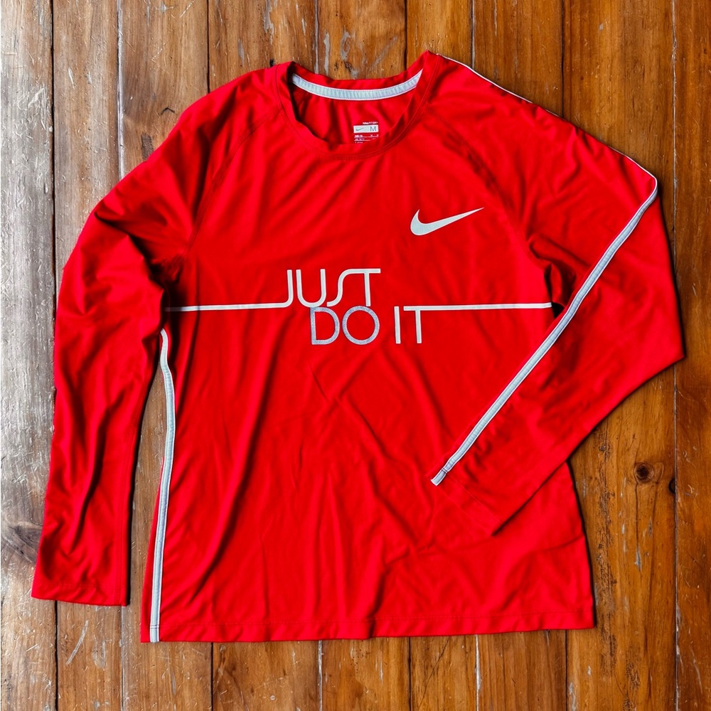Nike women’s Red Long Sleeve with White Swoosh Dri Fit Size M